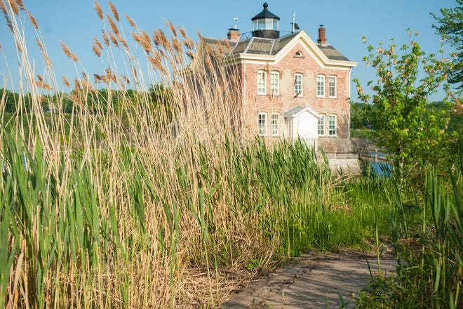 Enjoy a low-tide stroll through marshlands leading to the Saugerties Lighthouse for a tour of this 19th-century maritime navigation site. KELLY MARSH/FOR THE TIMES HERALD-RECORD