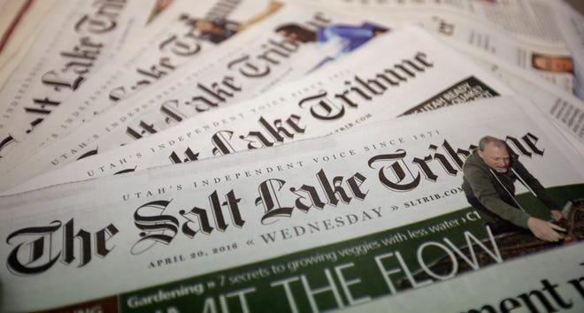 This April 20, 2016, file photo, copies of The Salt Lake Tribune newspaper is shown, in Salt Lake City. Tribune owner Paul Huntsman said in a statement Friday, July 29, 2016, that he wanted a more digitally focused newsroom leader. Former reporter Jennifer Napier-Pearce will take over for editor Terry Orme in September.