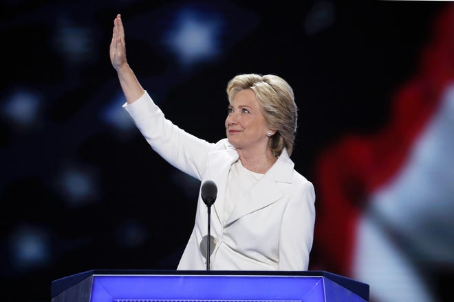 Democratic presidential nominee Hillary Clinton waves to delegates Thursday night before the acceptance speech that made her the first woman nominated for president by a major political party. AP Photo/J. Scott Applewhite