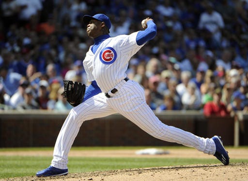 Chicago Cubs relief pitcher Aroldis Chapman (54) throws against the Seattle Mariners during the eighth inning of an interleague baseball game, Saturday, July 30, 2016, in Chicago. (AP Photo/David Banks)