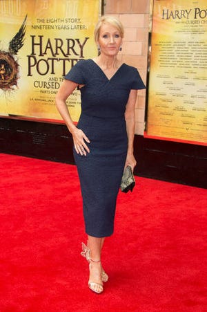 Writer J.K. Rowling poses for photographers upon arrival at gala performance of Harry Potter and the Cursed Child, at the Palace Theatre in central London, Saturday, July 30, 2016. Based on an original new story by J.K. Rowling, John Tiffany and Jack Thorne, it is the eighth story in the Harry Potter series and is the first of the stories to be presented on stage. (Photo by Joel Ryan/Invision/AP)