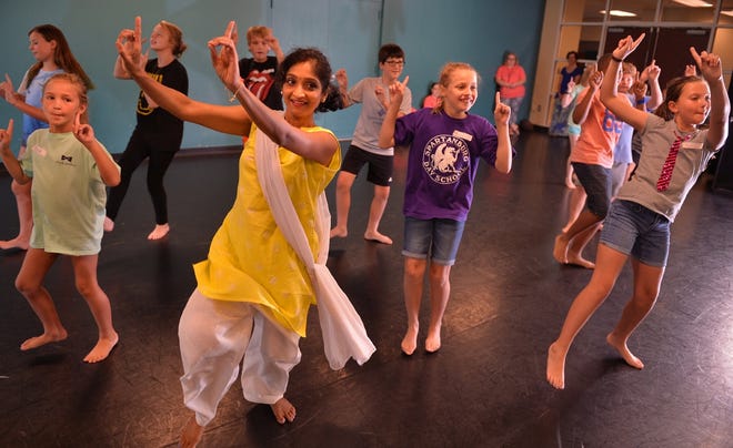 Sunitha Raj, artistic director at Nrithyanjali School of Dance in Greenville, teaches a class Monday to students in the new dance program at Converse College's Lawson Academy of the Arts at the college in Spartanburg. TIM KIMZEY/tim.kimzey@shj.com