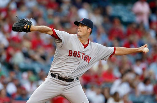 Boston Red Sox starting pitcher Drew Pomeranz delivers during the first inning of a baseball game against the the Los Angeles Angels in Anaheim, Calif., Saturday, July 30, 2016. (AP Photo/Christine Cotter)