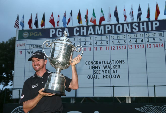Jimmy Walker poses with the trophy after winning the PGA Championship golf tournament at Baltusrol Golf Club in Springfield, N.J., Sunday, July 31, 2016. (AP Photo/Seth Wenig)