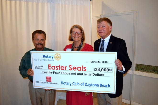 Pictured, from left, are Ed Paternetti, Easter Seals President and CEO Lynn Sinnott and Rotary Club President Mel Stack.
