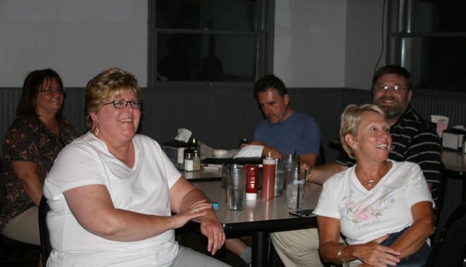 Library members await results of the millage during Tuesday night's election.