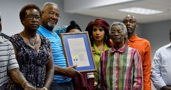 Family members of Walter Irvin, one of the Groveland Four, are photographed at a ceremony on behalf of the Groveland Four at the County Administration Building on March 15 in Tavares. Each family member received a proclamation from the county apologizing for the events that occurred in 1949. (Amber Riccinto/ Daily Commercial)