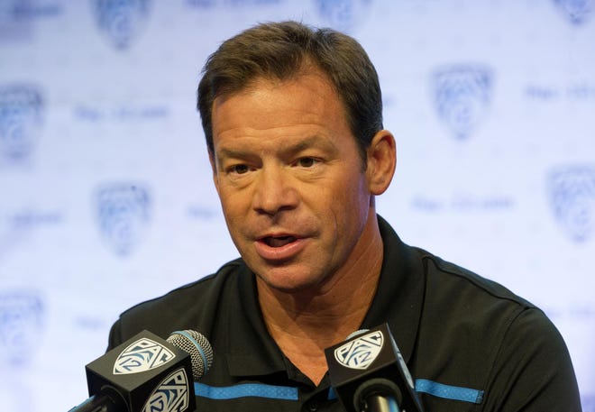 UCLA Head Football Coach Jim Mora takes questions during Pac-12 Media Days in Hollywood, Calif. (Chris Pietsch/The Register-Guard)