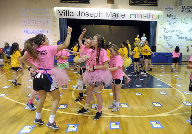 (File) Students dance at the fourth annual mini-THON dance marathon at Villa Joseph Marie High School in December. The event, in which the students dance for 10 hours straight, raises money for the Four Diamonds Fund at Penn State Hershey Children's Hospital.