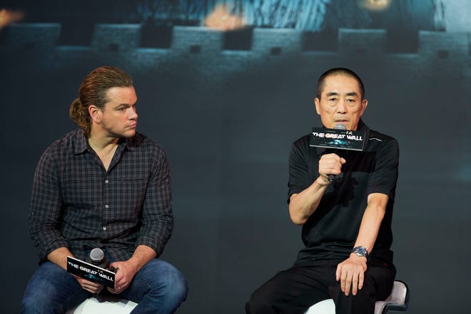 FILE - In this July 2, 2015, file photo, movie director Zhang Yimou, right, speaks next to actor Matt Damon during a news conference of their latest movie "The Great Wall" held at a hotel in Beijing. Acclaimed Chinese director Zhang Yimou responded to criticism from an Asian-American actress over the casting of Matt Damon as his movie's lead, saying the role was never conceived for a Chinese actor. (AP Photo/Andy Wong, File)