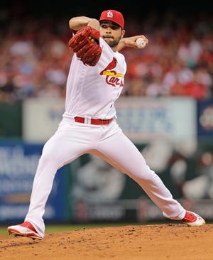 St. Louis Cardinals starting pitcher Jaime Garcia winds up during the second inning of a baseball game against the Atlanta Braves, Friday, Aug. 5, 2016, in St. Louis. (AP Photo/Tom Gannam)
