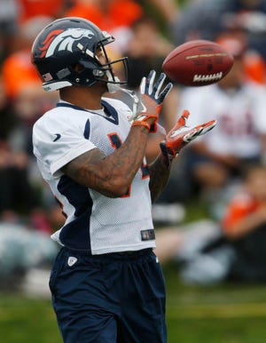 Denver Broncos wide receiver Cody Latimer pulls in a pass during drills at the team's NFL football training camp Friday, Aug. 5, 2016 in Englewood, Colo. (AP Photo/David Zalubowski)