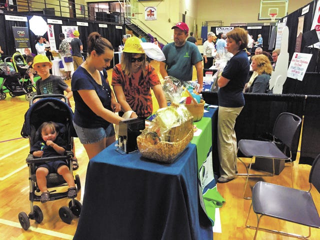 Saturday's Livability Expo featured opportunities for attendees to enter and win door prizes, sign up for programs and learn about upcoming events in Maury County. (Staff photo by Jay Powell)