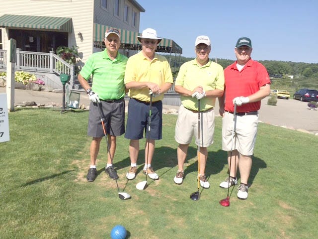 The team from Battle Creek Urbandale took first place shooting a 17 under par. The team includes Curtis Wolf, Bob Wolf, Dave Robinson and Charlie Moore. COURTESY PHOTO