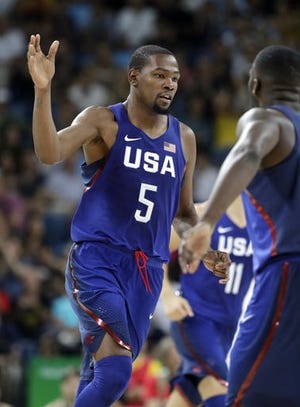 Kevin Durant (5) celebrates a basket against China on Saturday. AP Photo/Eric Gay
