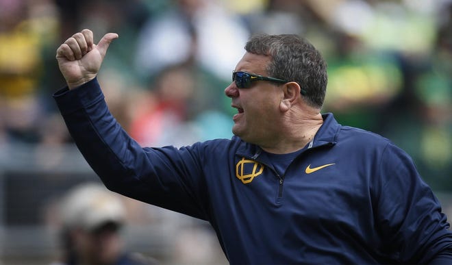 Oregon defensive coordinator Brady Hoke will have a lot of work to do with a defense that ranked 116th in points allowed. (Andy Nelson/The Register-Guard)
