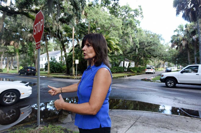 Jeanette Booth stands at the intersection of Nelmar Avenue and Douglas Avenue on Thursday near her home in the Nelmar Terrace neighborhood.