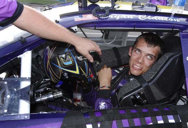 Bryan Clauson smiles in his car during qualifying for the 2007 ARCA RE/MAX Series 250 at Talladega Superspeedway. ASSOCIATED PRESS FILE / RAINIER EHRHARDT