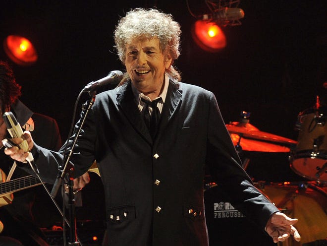 FILE - In this Jan. 12, 2012, file photo, Bob Dylan performs in Los Angeles.