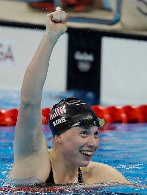 United States' Lilly King celebrates winning the gold medal in the women's 100-meter breaststroke during the swimming competitions at the 2016 Summer Olympics, Monday, Aug. 8, 2016, in Rio de Janeiro, Brazil.