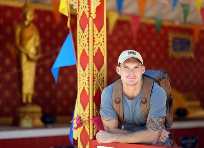 Striedel pictured at the Wat Mongkolratanaram Buddhist Temple, a Thai-inspired temple, in Fort Walton Beach. The 24-year-old will be setting off for Thailand in January to spend two years with the Peace Corps.