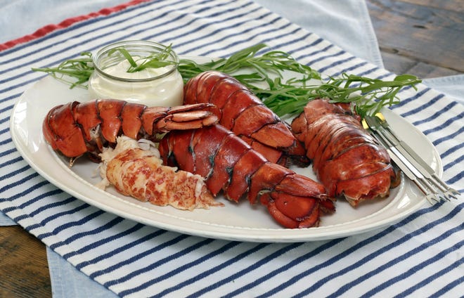 Lobster tails with Pastis creme are shown here styled by Sarah Abrams of the Institute of Culinary Education in New York. This dish is from a recipe by Elizabeth Karmel. (AP Photo/Richard Drew)