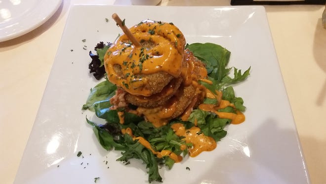 Rose Villa Southern Table and Bar's Fried Green Tomato Tower is packed with lobster between the layers. NEWS-JOURNAL/DENISE O'TOOLE KELLY