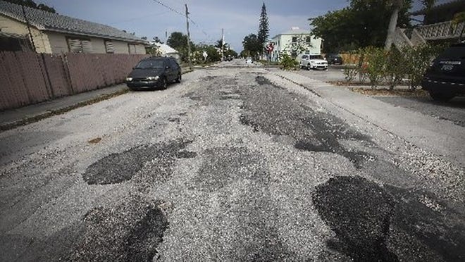 Lake Worth commissioners at an Aug. 25 workshop are expected to reveal the streets that will be repaired if the $40 million road repair bond passes in November. (Bruce R. Bennett/The Palm Beach Post)