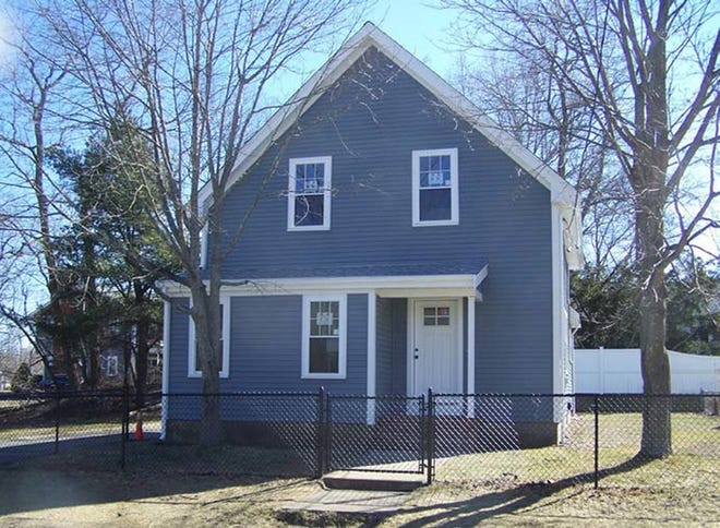 Mother of three Cerissa Correia won the lottery for this home at 36 Jireh St. in New Bedford. COURTESY PHOTO