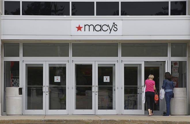 In this July 10, 2015, file photo, shoppers walk into a Macy's department store at the Hanover Mall in Hanover, Mass. (AP Photo/Stephan Savoia, File)