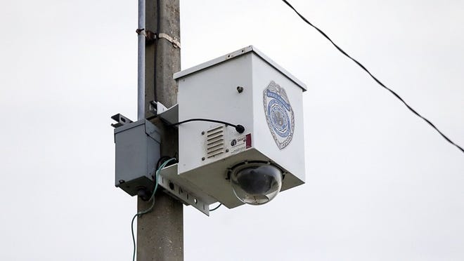 City surveillance camera on a pole at north end of Dunbar Village, north of downtown. (Damon Higgins / The Palm Beach Post)