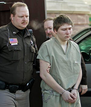 FILE - In this Friday, March 3, 2006 photo, Brendan Dassey, 16, is escorted out of a Manitowoc County Circuit courtroom in Manitowoc, Wis. A federal court in Wisconsin on Friday overturned the conviction of Dassey, a man found guilty of helping his uncle kill Teresa Halbach in a case profiled in the Netflix documentary "Making a Murderer." (AP Photo/Morry Gash, File)