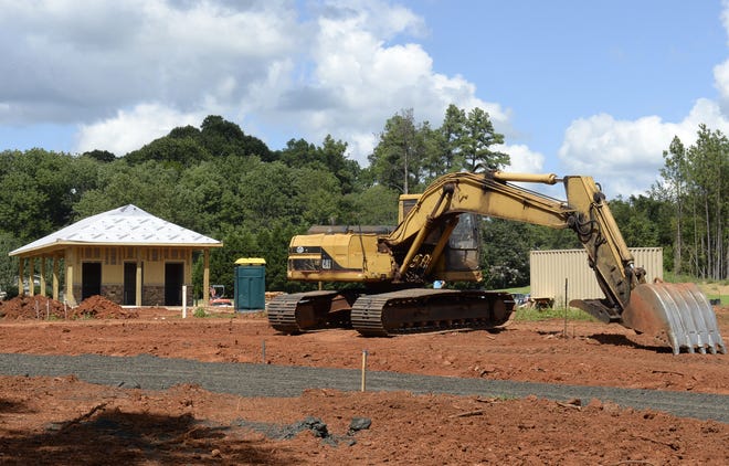 Construction continues on the future Graham Recreation Complex which will feature walking trails, shelters, soccer fields and an obstacle course when the first phase of the 118-acre park is complete this December. 

Steven Mantilla/Times-News