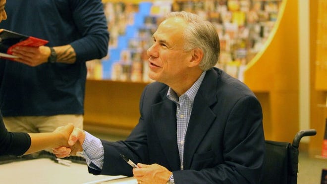 Governor Greg Abbott held a signing May 25 for his new book “Broken but Unbowed” at the Barnes and Noble in Round Rock. Photo by Nicole Barrios