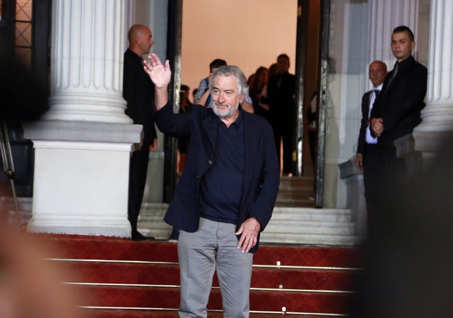 Robert De Niro waves to supporters on the red carpet as he arrive for the opening of the Sarajevo Film Festival in Sarajevo, Bosnia on Friday. THE ASSOCIATED PRESS