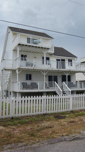 Three levels of decks and porches facing the ocean highlight this beachfront five-bedroom house for sale at 6330 S. Atlantic Ave. in New Smyrna Beach. NEWS-JOURNAL/BOB KOSLOW