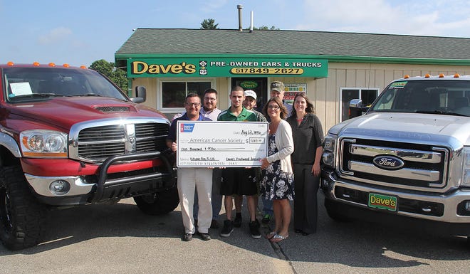 The staff of Dave's Pre-Owned Cars and Trucks presented the American Cancer Society with a check for $1,000 from team Nutrition Extreme. A portion of the money from every car sold in July went toward the donation. Pictured include, Scott Loomis, Matt Loomis, Austin Cunningham, Don Fox, Ron Fox, April Wagner and Caralee Waswick, Relay for Life specialist at the American Cancer Society. Not pictured is Jerry Happ. ANDY BARRAND PHOTO