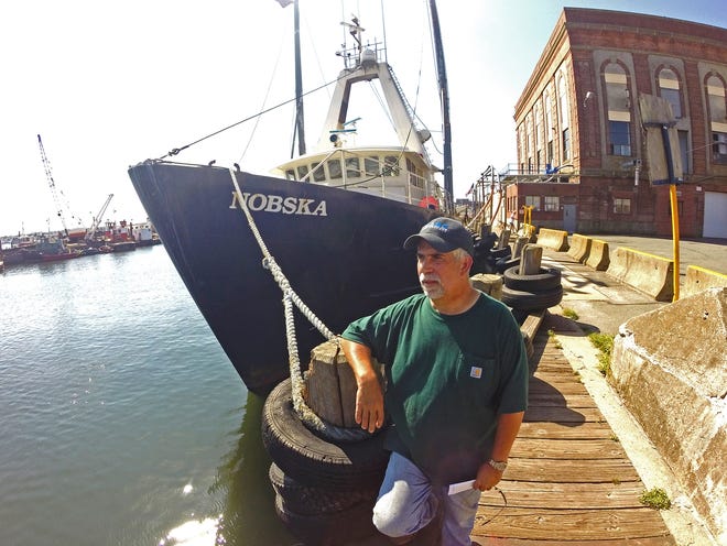 Captain Geoff Hatfield of the New Bedford-based trawler Nobska stands on the dock before steaming out to the Nantucket Shoals for a five-day fishing trip. The Providence Journal/Mark Patinkin