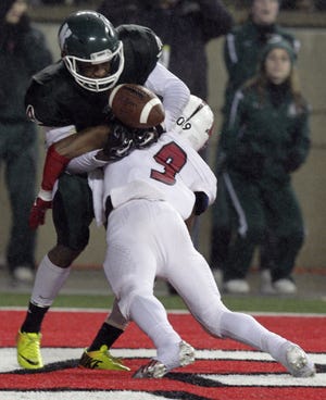 Cincinnati LaSalle's Pierre Hunter, right, breaks up a pass intended for Macedonia Nordonia's Denzel Ward during the first quarter of the Division II state high school football championship game at Ohio Stadium Friday, Dec. 5, 2014, in Columbus, Ohio. (AP Photo/Jay LaPrete)
