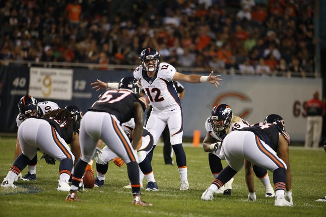 Denver Broncos quarterback Paxton Lynch (12) lines up for a play Thursday during the second half of an NFL preseason football game against the Chicago Bears. Associated Press/Nam Y. Huh