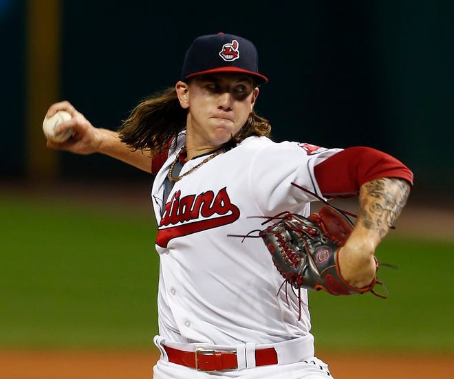 Cleveland Indians starting pitcher Mike Clevinger delivers against the Los Angeles Angels during the first inning of a baseball game Saturday, Aug. 13, 2016, in Cleveland. (AP Photo/Ron Schwane)