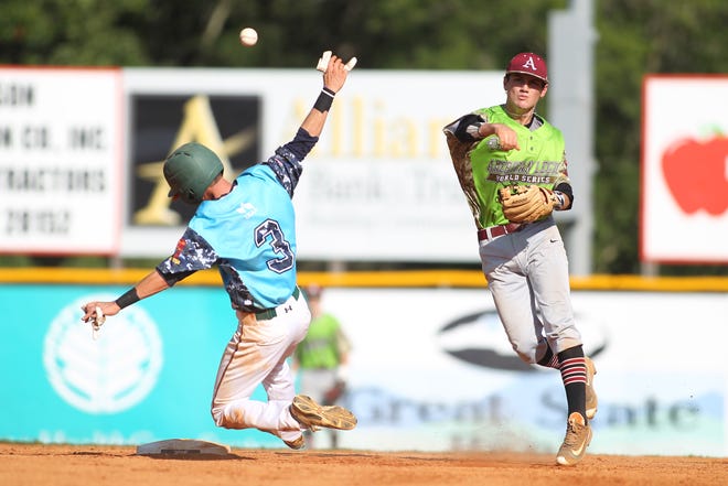 Texarkana's Riley Orr throws to first against Leesburg's Jake Cunningham on Sunday afternoon during Game 11 of the American LEgion World Series. Hannah Dunaway/ The Star