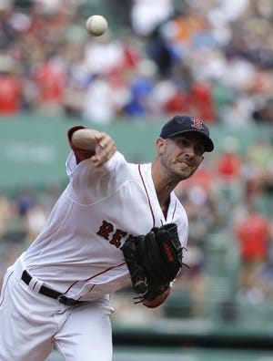 Rick Porcello pitched the Red Sox over the Diamondbacks to improve his record to 16-3. The Associated Press