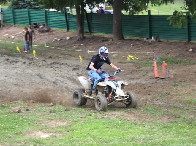A competitor makes his way through the mud pit at Chester Park during the mud bogs on Sunday. ANDREW KING PHOTO