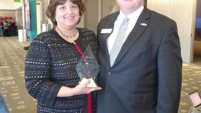 Karen Kahan received an award last week from the Texas Computer Education Association, or TCEA, for being a Friend of Education. She is pictured with TCEA President David Jacobson. CONTRIBUTED