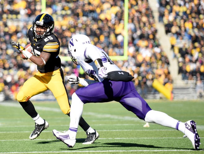 Iowa’s Akrum Wadley (25) knows that being consistent is the only way he’ll stay in the Hawkeyes’ running back rotation.