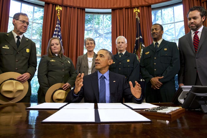 In this July 10, 2015, file photo, President Barack Obama, center, talks about the designation of three new national monuments; Berryessa Snow Mountain in California, Waco Mammoth in Texas, and the Basin and Range in Nevada, in the Oval Office of the White House in Washington.

AP Photo/Jacquelyn Martin, File