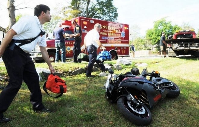 Easton Fire Chief Kevin Partridge responds to a motorcycle accident -- one of many varied emergencies that were called in during a two-hour period on Monday. Marc Vasconcellos / Brockton Enterprise photo