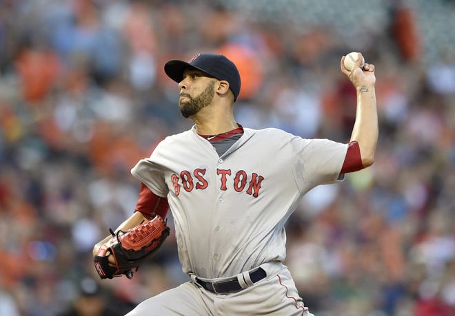 Red Sox starting pitcher David Price winds up during the first inning Wednesday night in Baltimore. AP Photo/Nick Wass