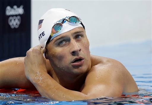 In this Tuesday, Aug. 9, 2016, file photo, United States' Ryan Lochte checks his time in a men's 4x200-meter freestyle heat during the swimming competitions at the 2016 Summer Olympics, in Rio de Janeiro, Brazil.